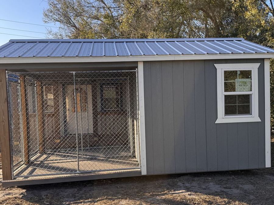 Dog kennel building with covered run