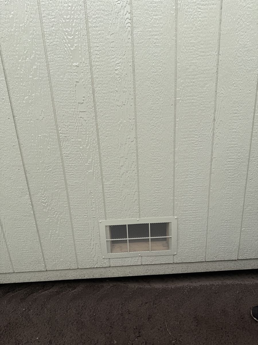 A flood vent low down in the wall