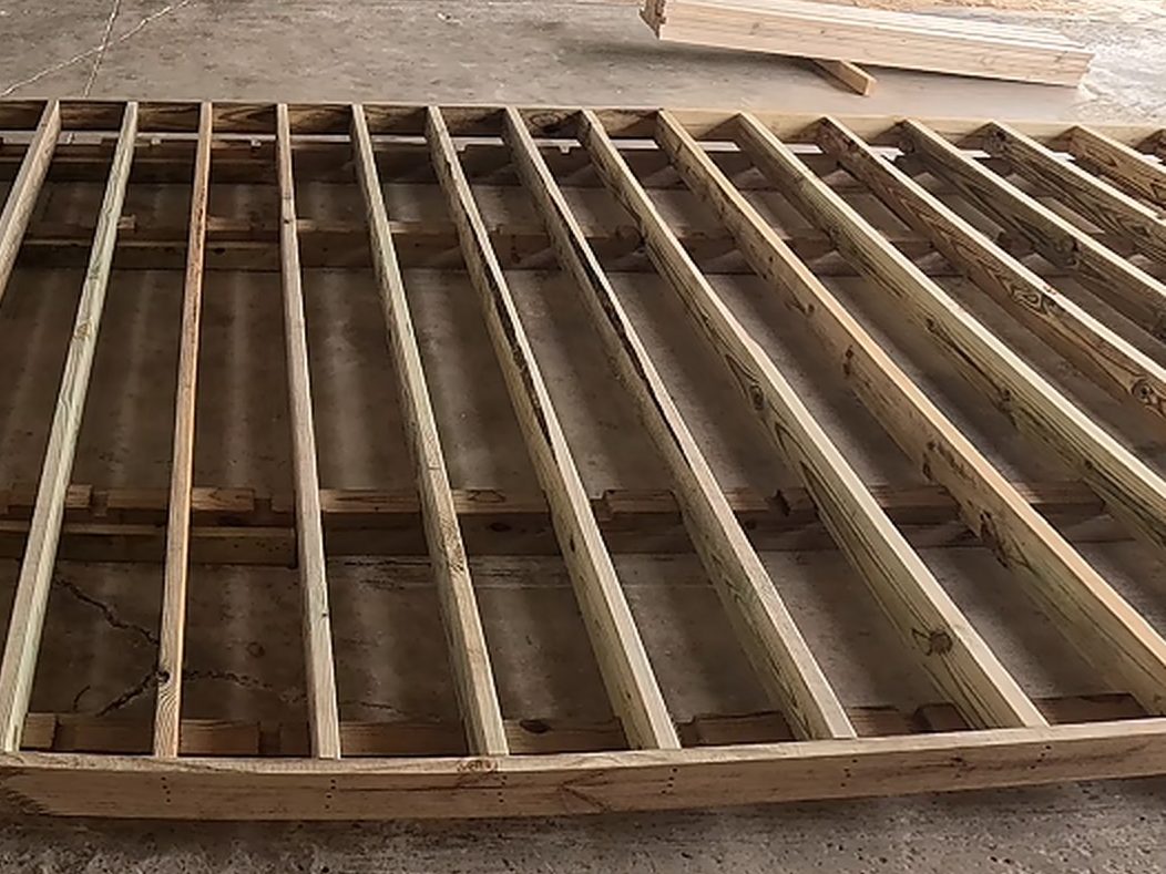 Joists set a foot apart, before the floor goes down